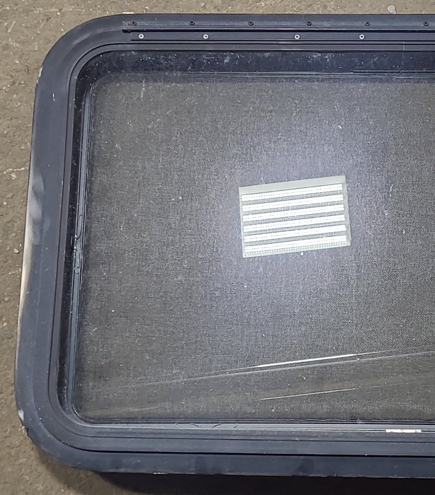 Used Black Radius Emergency Opening Window : 35 3/8" W x 21 3/8" H x 1 5/8" D