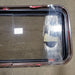 Used Black Radius Emergency Opening Window : 35 5/8" W X 17 3/4" H X 2" D - Young Farts RV Parts