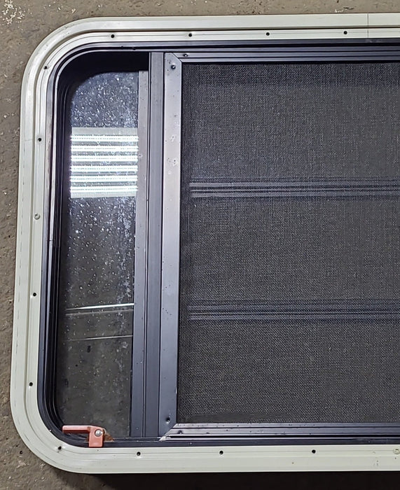 Used Black Radius Emergency Opening Window : 35" W x 21 1/4" H x 1 3/4" D - Young Farts RV Parts