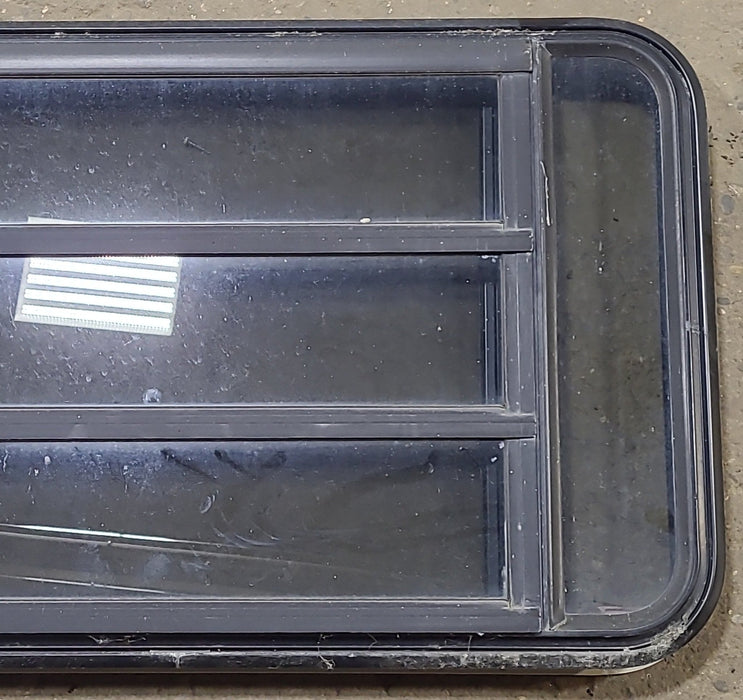 Used Black Radius Emergency Opening Window : 35" W x 21 1/4" H x 1 3/4" D