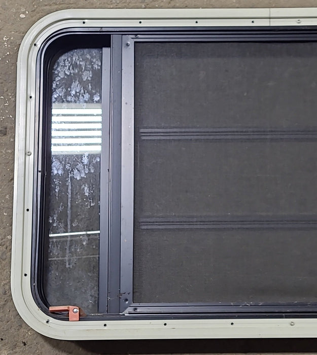 Used Black Radius Emergency Opening Window : 35" W x 21 1/4" H x 1 3/4" D