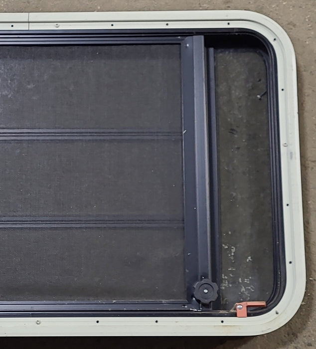 Used Black Radius Emergency Opening Window : 35" W x 21 1/4" H x 1 3/4" D - Young Farts RV Parts