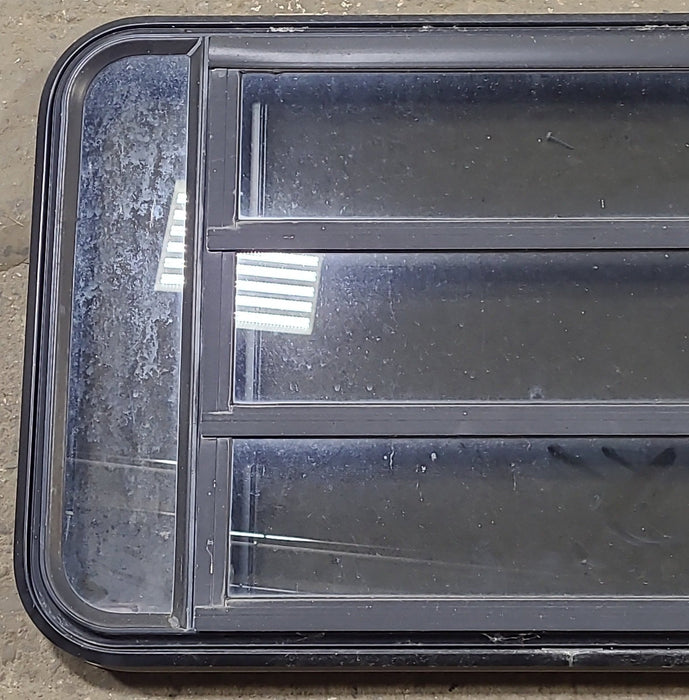 Used Black Radius Emergency Opening Window : 35" W x 21 1/4" H x 1 3/4" D