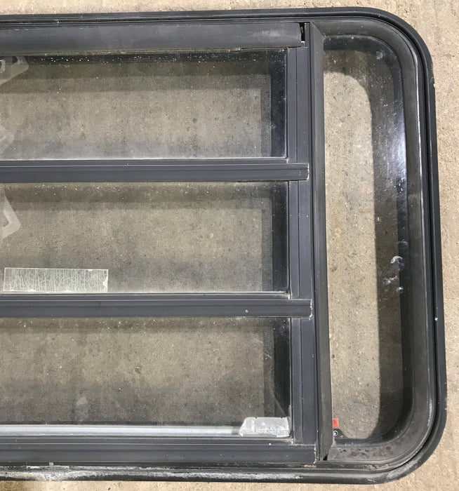 Used Black Radius Emergency Opening Window : 35" W x 21 1/4" H x 1 7/8" D