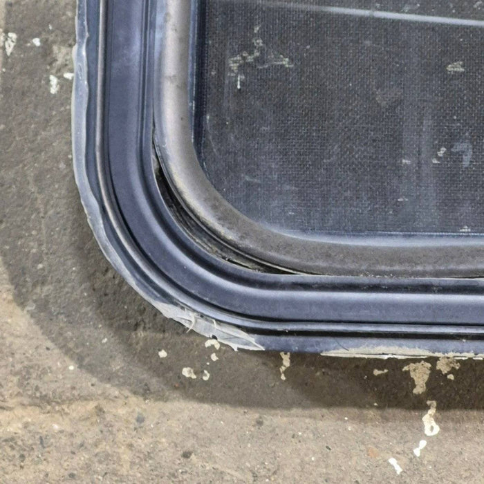 Used Black Radius Emergency Opening Window : 35" X 21.25" X 1.875"