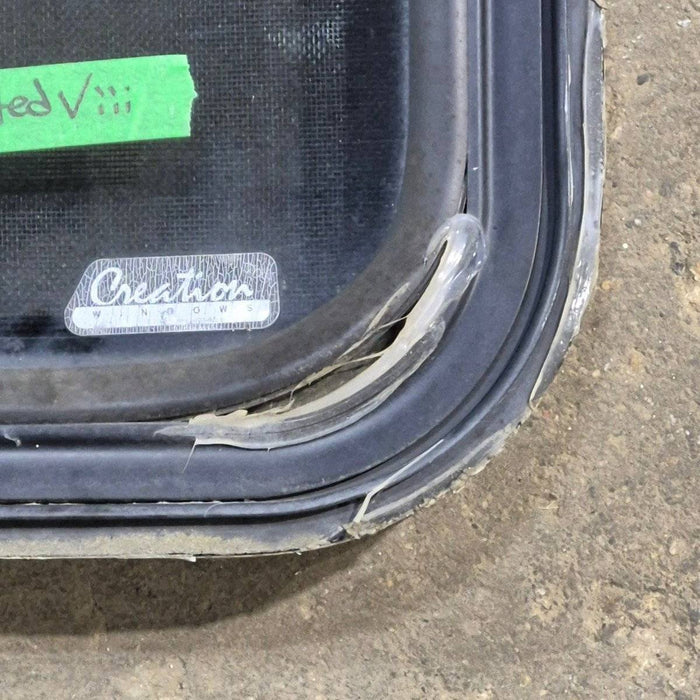 Used Black Radius Emergency Opening Window : 35" X 21.25" X 1.875"