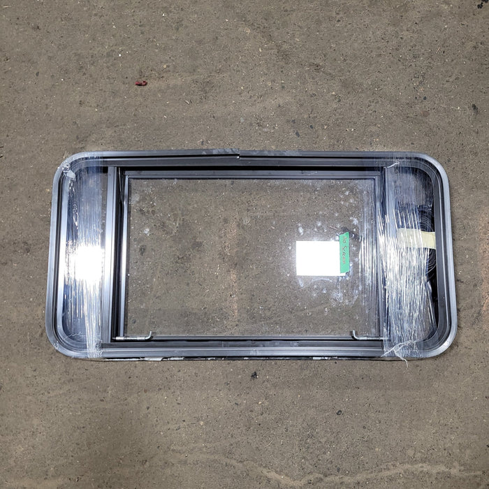 Used Black Radius Emergency Opening Window : 36 1/2" W X 18 1/4" H X 2" D - Young Farts RV Parts