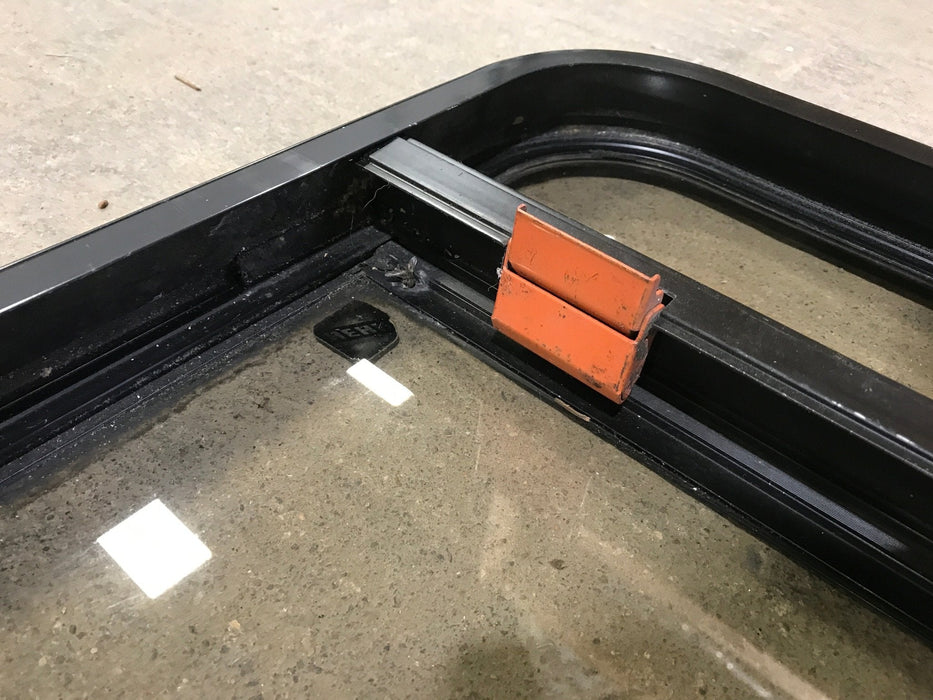 Used Black Radius Emergency Opening Window : 36 1/2" W x 23 1/2" H x 1 1/2"
