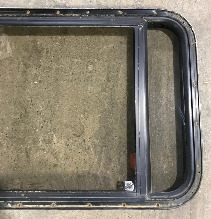 Used Black Radius Emergency Opening Window : 36 1/2" W x 23 1/2" H x 1 1/2"