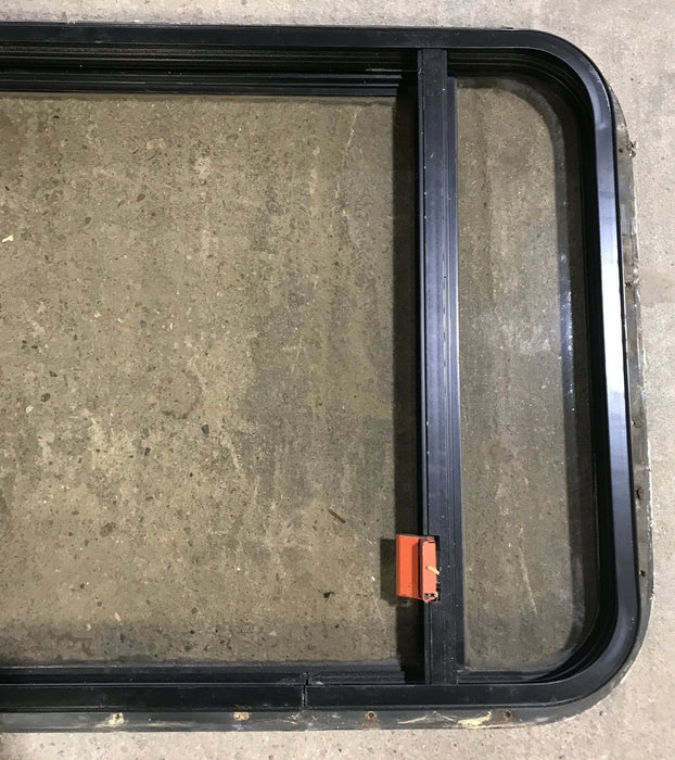 Used Black Radius Emergency Opening Window : 36 1/2" W x 23 1/2" H x 1 1/2"