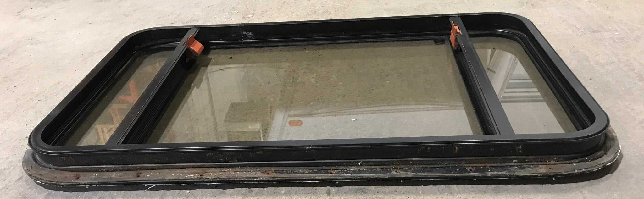 Used Black Radius Emergency Opening Window : 36 1/2" W x 23 1/2" H x 1 1/2"