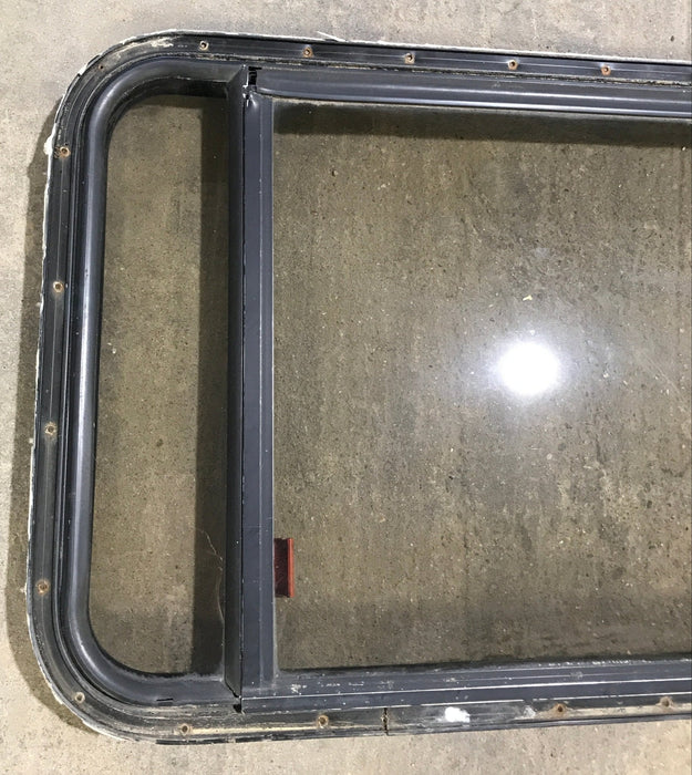 Used Black Radius Emergency Opening Window : 36 1/2" W x 23 1/2" H x 1 1/2"