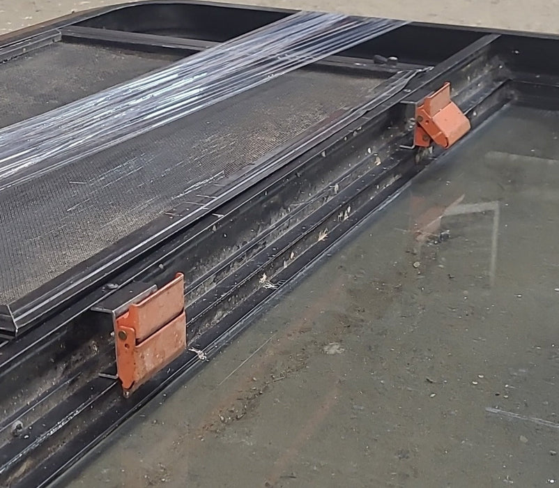 Used Black Radius Emergency Opening Window : 36 1/2" W x 36 3/4" H x 1 3/8" D