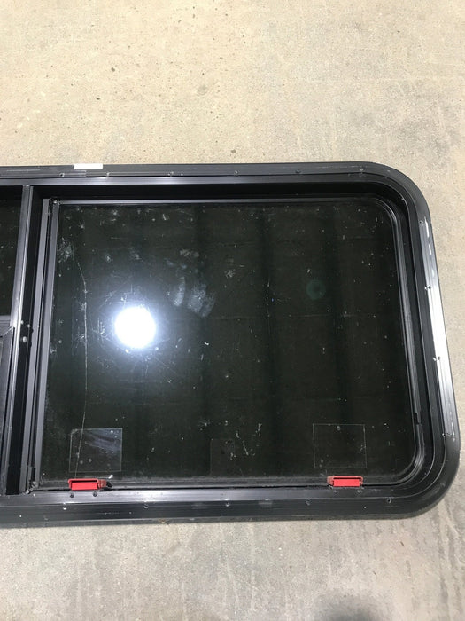 Used Black Radius Emergency Opening Window : 41 1/2" W x 21 1/2" H x 1 7/8"