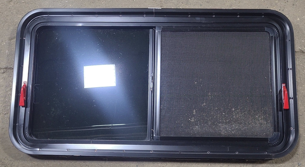 Used Black Radius Emergency Opening Window : 41 1/2" W x 21 1/2" H x 1 7/8" D - Young Farts RV Parts