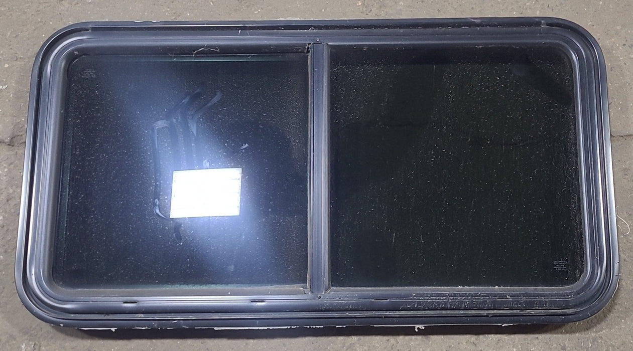 Used Black Radius Emergency Opening Window : 41 1/2" W x 21 1/2" H x 1 7/8" D - Young Farts RV Parts