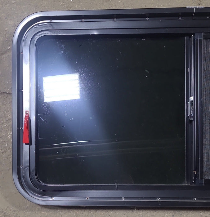 Used Black Radius Emergency Opening Window : 41 1/2" W x 21 1/2" H x 1 7/8" D
