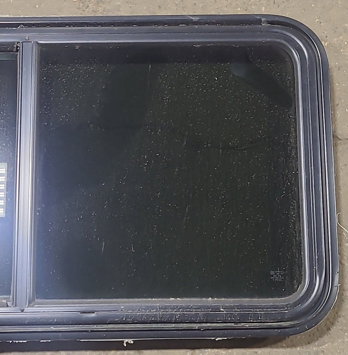 Used Black Radius Emergency Opening Window : 41 1/2" W x 21 1/2" H x 1 7/8" D - Young Farts RV Parts