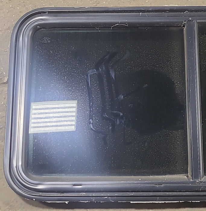 Used Black Radius Emergency Opening Window : 41 1/2" W x 21 1/2" H x 1 7/8" D