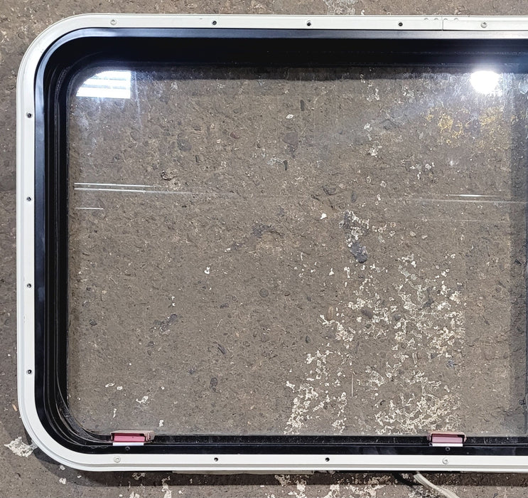 Used Black Radius Emergency Opening Window : 41 1/2" W x 21 3/4" H x 1 1/4" D