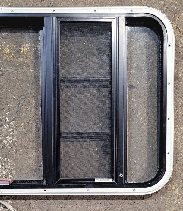 Used Black Radius Emergency Opening Window : 41 1/2" W x 21 3/4" H x 1 1/4" D