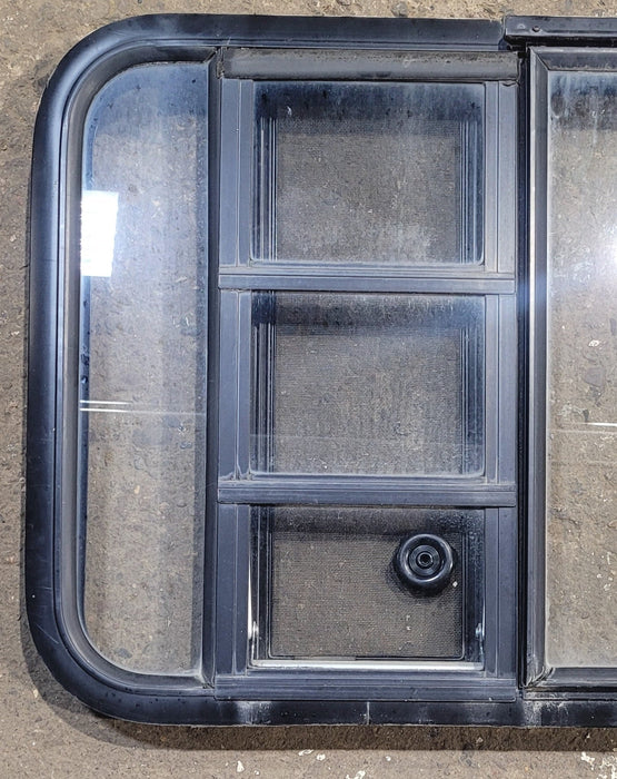 Used Black Radius Emergency Opening Window : 41 1/2" W x 21 3/4" H x 1 1/4" D