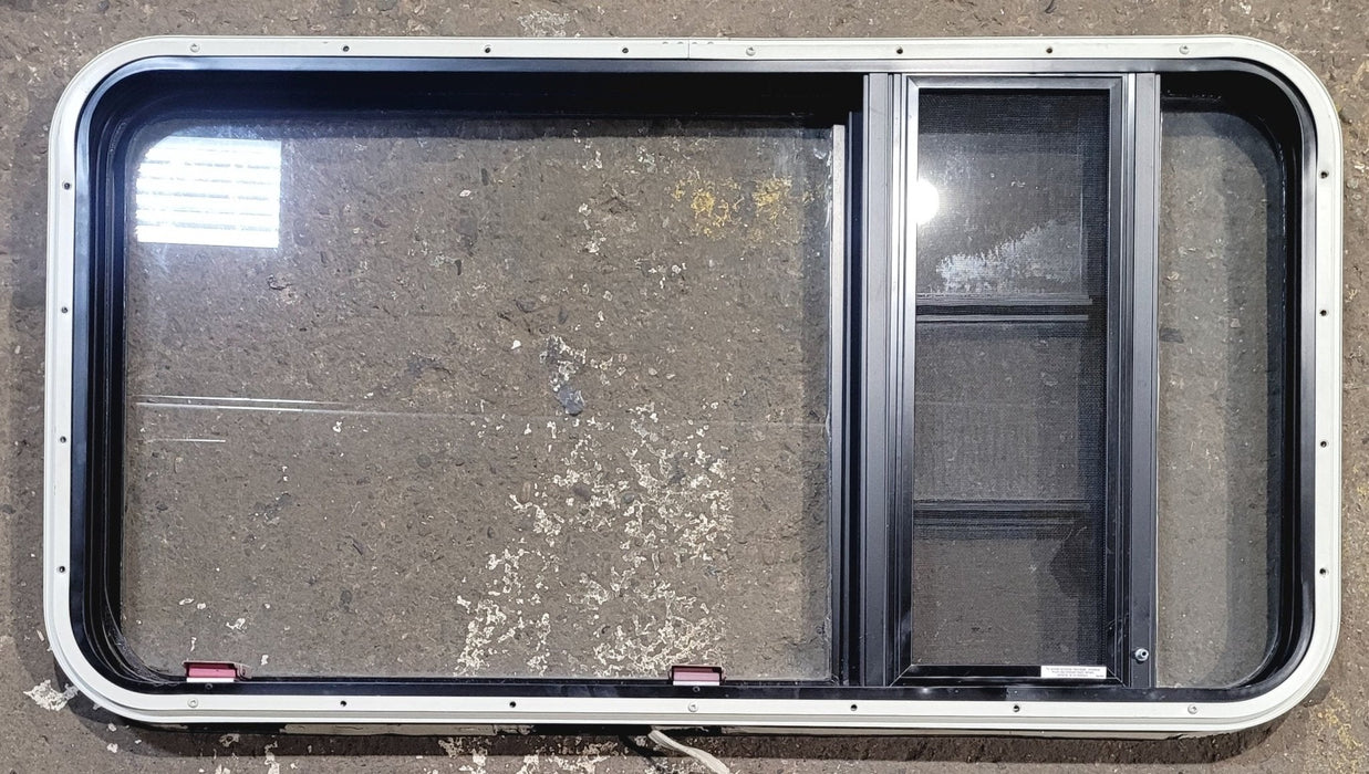 Used Black Radius Emergency Opening Window : 41 1/2" W x 21 3/4" H x 1 1/4" D