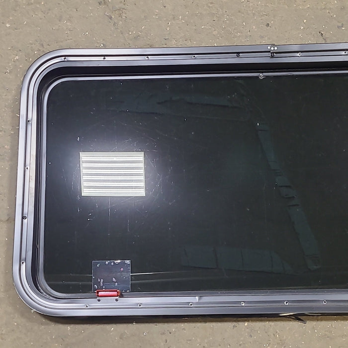 Used Black Radius Emergency Opening Window : 41 3/8" W X 21 1/4" H X 2" D
