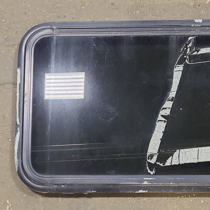 Used Black Radius Emergency Opening Window : 41 3/8" W X 21 1/4" H X 2" D