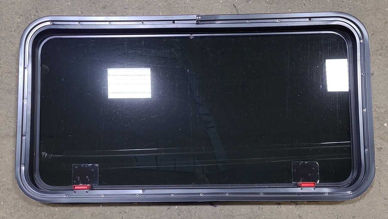 Used Black Radius Emergency Opening Window : 41 3/8" W X 21 1/4" H X 2" D