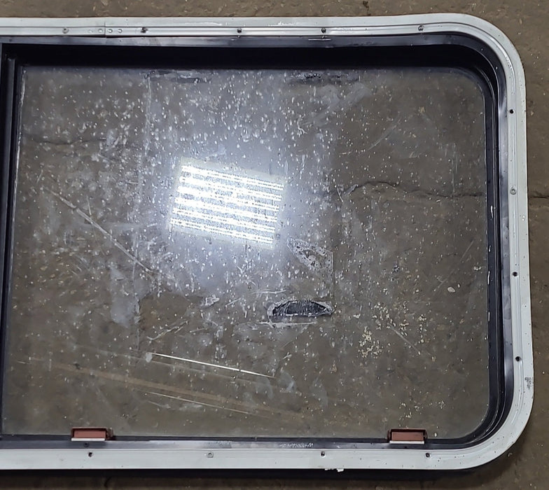 Used Black Radius Emergency Opening Window : 41 3/8" W x 21 5/8" H x 1 7/8" D