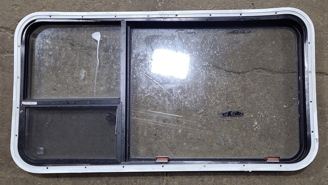 Used Black Radius Emergency Opening Window : 41 3/8" W x 21 5/8" H x 1 7/8" D