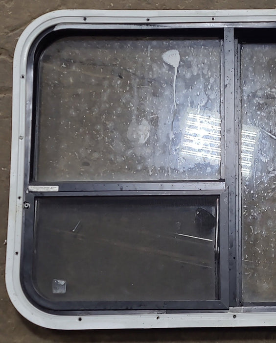Used Black Radius Emergency Opening Window : 41 3/8" W x 21 5/8" H x 1 7/8" D