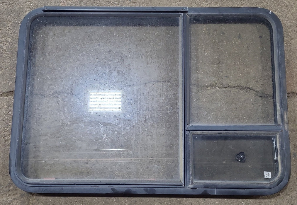 Used Black Radius Emergency Opening Window : 41 3/8" W x 28 5/8" H x 1 7/8" D