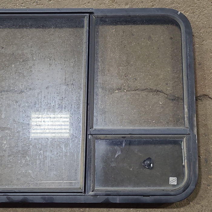 Used Black Radius Emergency Opening Window : 41 3/8" W x 28 5/8" H x 1 7/8" D