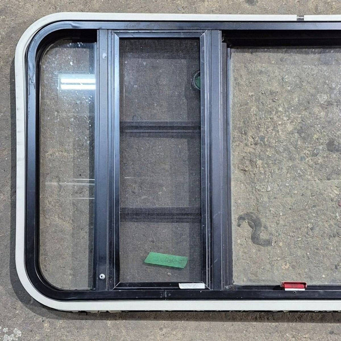 Used Black Radius Emergency Opening Window - 41.625 X 21.875 X 1.375