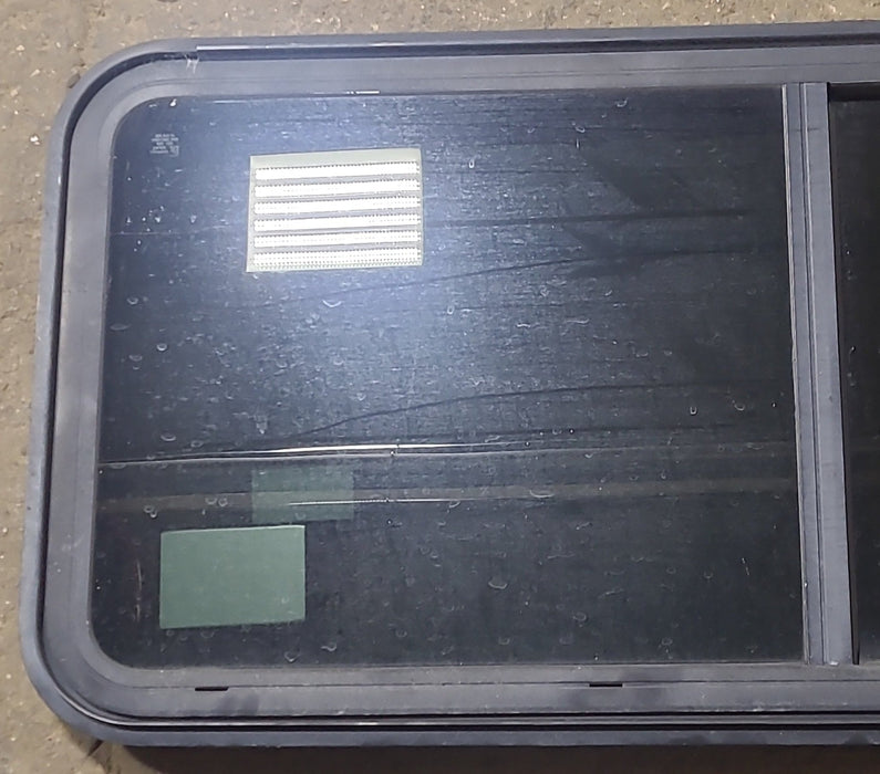 Used Black Radius Emergency Opening Window : 47 1/2" W x 21 3/8" H x 1 3/4" D - Young Farts RV Parts