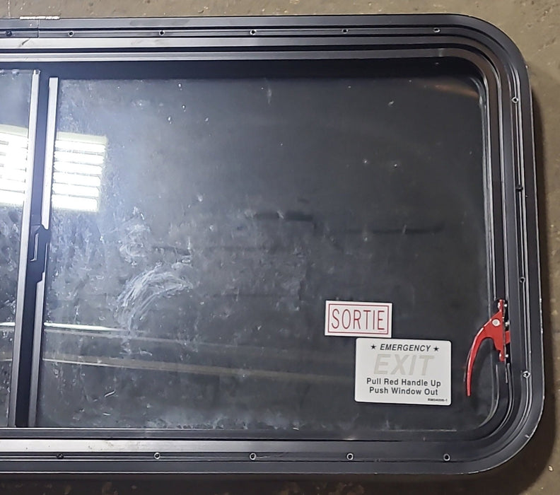 Used Black Radius Emergency Opening Window : 47 1/2" W x 21 3/8" H x 1 3/4" D - Young Farts RV Parts