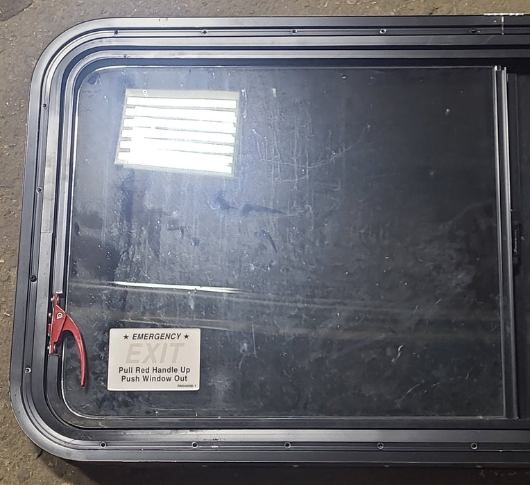 Used Black Radius Emergency Opening Window : 47 1/2" W x 21 3/8" H x 1 3/4" D - Young Farts RV Parts