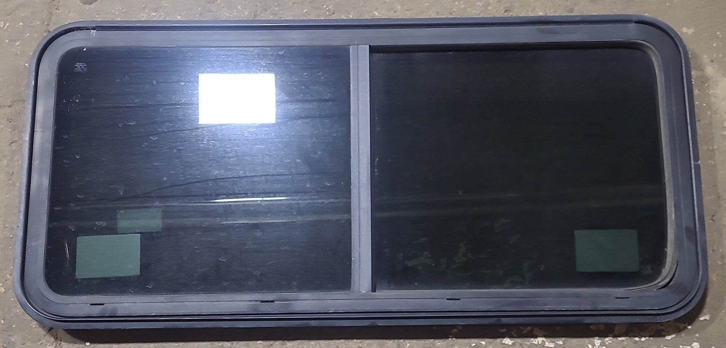 Used Black Radius Emergency Opening Window : 47 1/2" W x 21 3/8" H x 1 3/4" D - Young Farts RV Parts