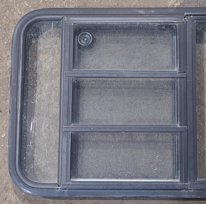 Used Black Radius Emergency Opening Window : 47 1/2" W x 22 1/4" H x 1 7/8" D