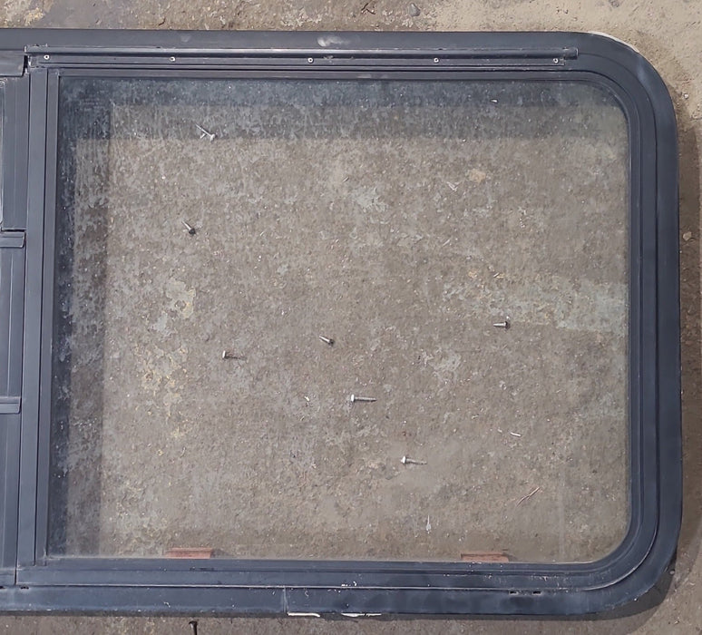 Used Black Radius Emergency Opening Window : 47 1/2" W x 22 1/4" H x 1 7/8" D
