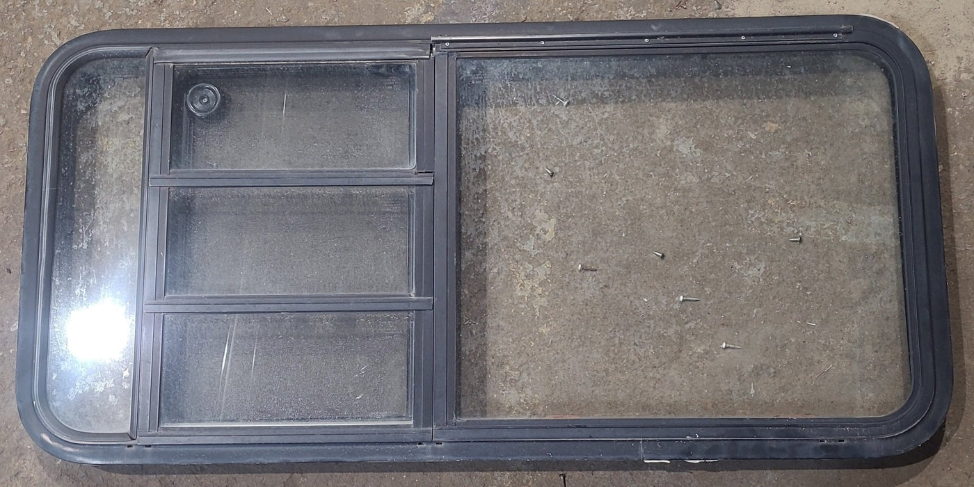 Used Black Radius Emergency Opening Window : 47 1/2" W x 22 1/4" H x 1 7/8" D