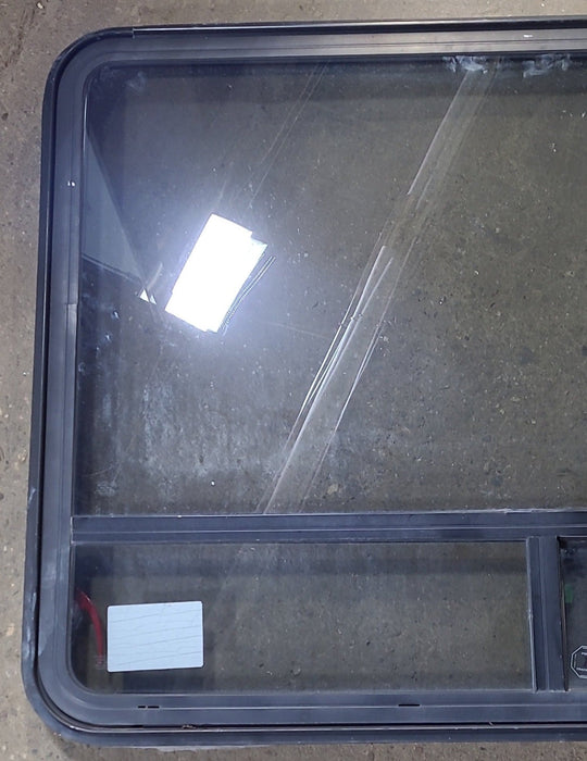 Used Black Radius Emergency Opening Window : 47 1/2" W x 35 1/4" H x 1 3/4" D
