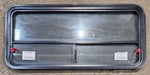 Used Black Radius Emergency Opening Window : 47 1/4" W x 21 1/4" H x 1 3/4" D - Young Farts RV Parts