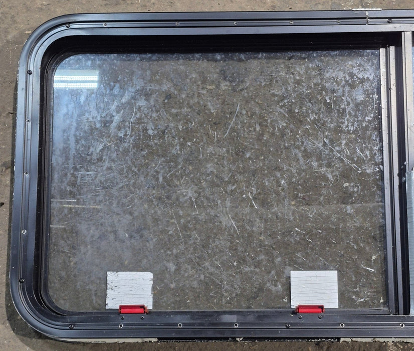 Used Black Radius Emergency Opening Window : 47 1/4" W x 21 1/4" H x 1 3/4" D