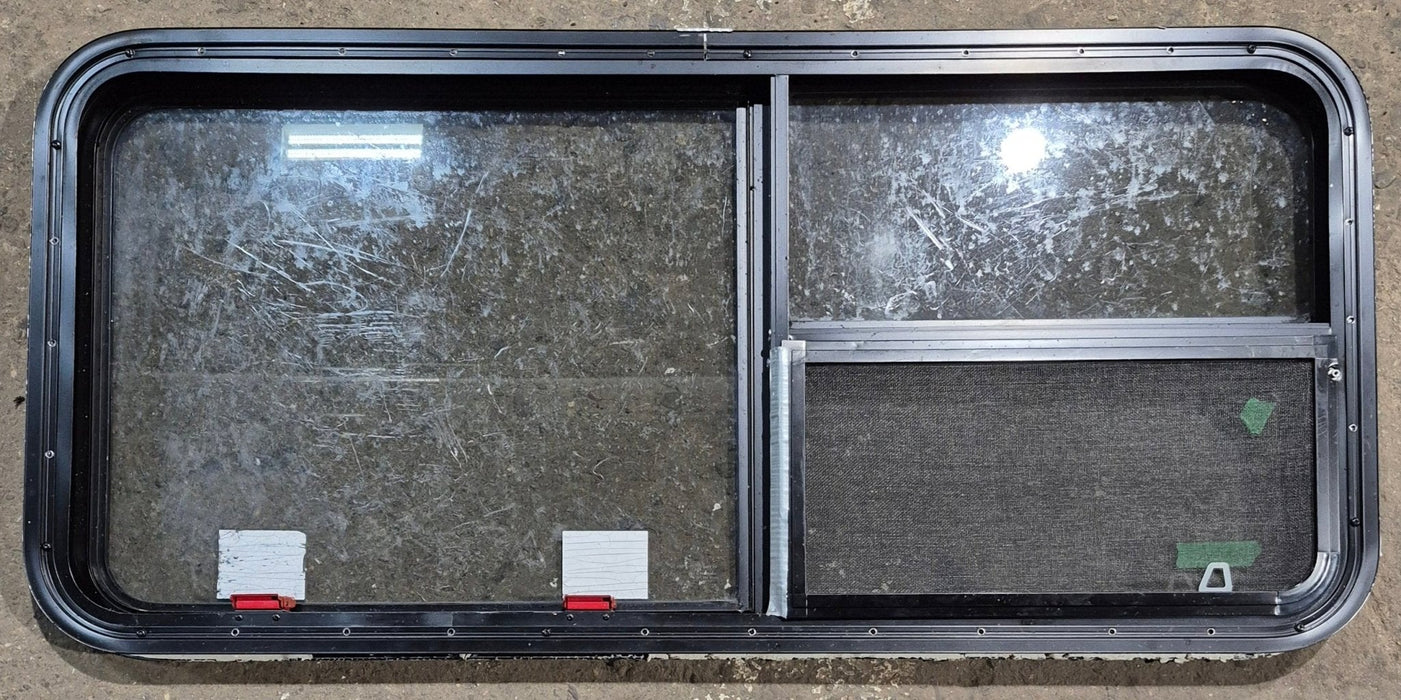 Used Black Radius Emergency Opening Window : 47 1/4" W x 21 1/4" H x 1 3/4" D