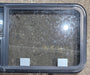 Used Black Radius Emergency Opening Window : 47 1/4" W x 21 1/4" H x 1 3/4" D - Young Farts RV Parts