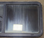 Used Black Radius Emergency Opening Window : 47 5/8" W x 21 1/2" H x 1 7/8" D - Young Farts RV Parts