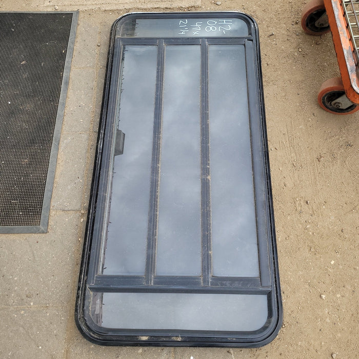 Used Black Radius Emergency Opening Window : 47 X 21 1/4 X 2 1/2" D - Young Farts RV Parts